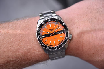 Seiko SRPK11K1 (Seiko 5 Sports) Men’s Automatic Orange Dial Watch | Stainless Steel Sports Timepiece
